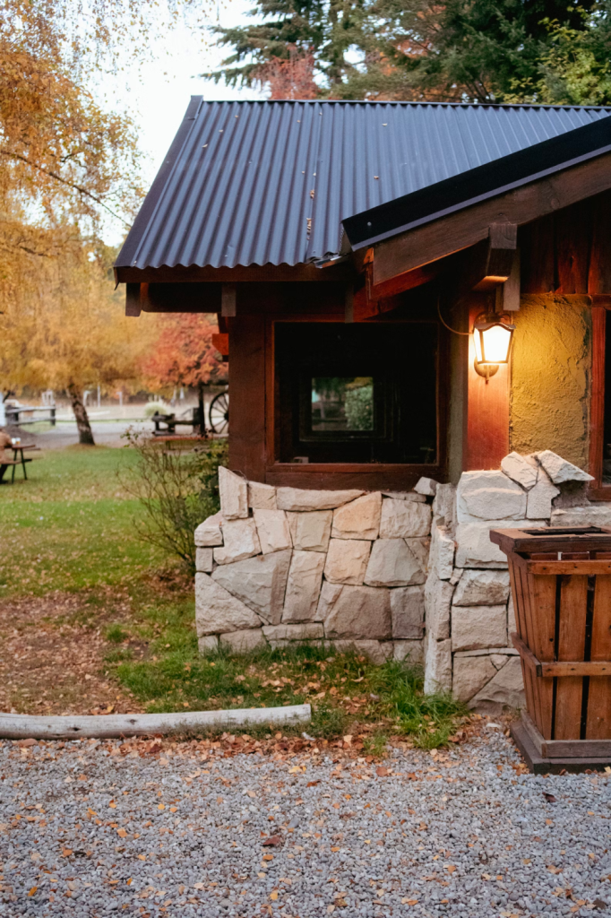 A retaining wall on the exterior of a guest house.