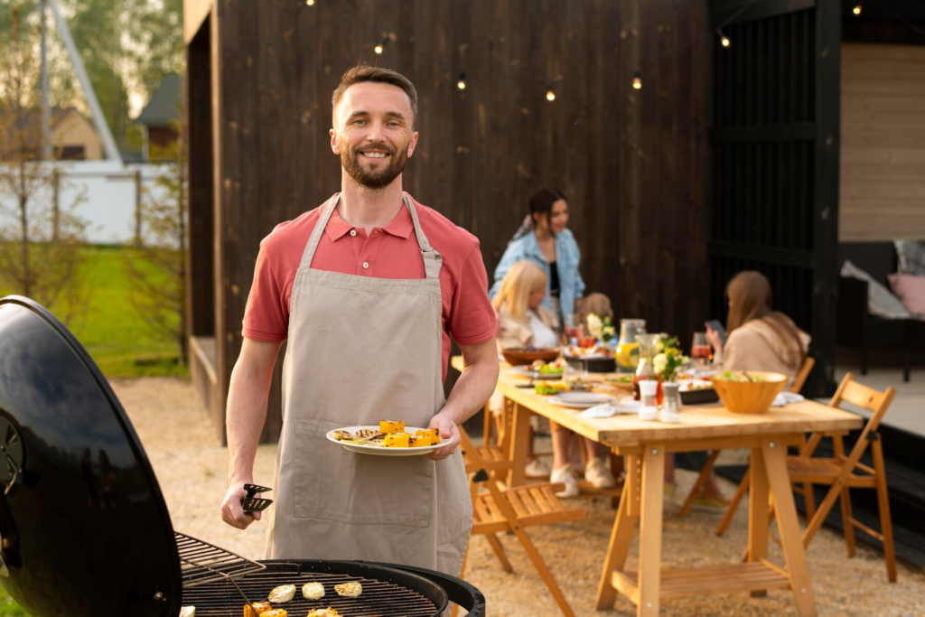 A man grills in his kitchen