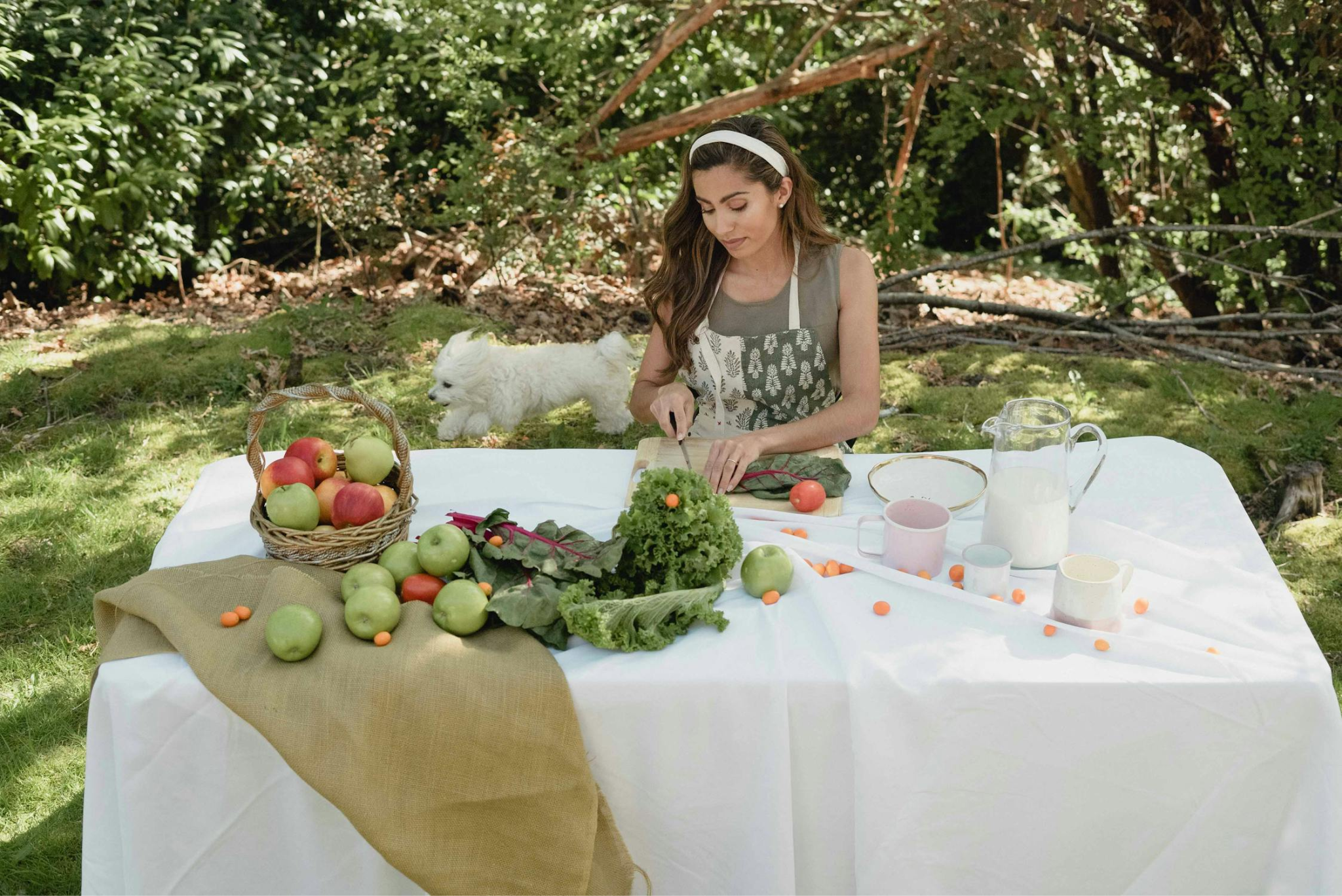 A woman prepares food outdoors